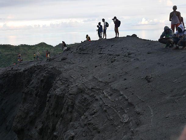 standing on rim of mt yasur