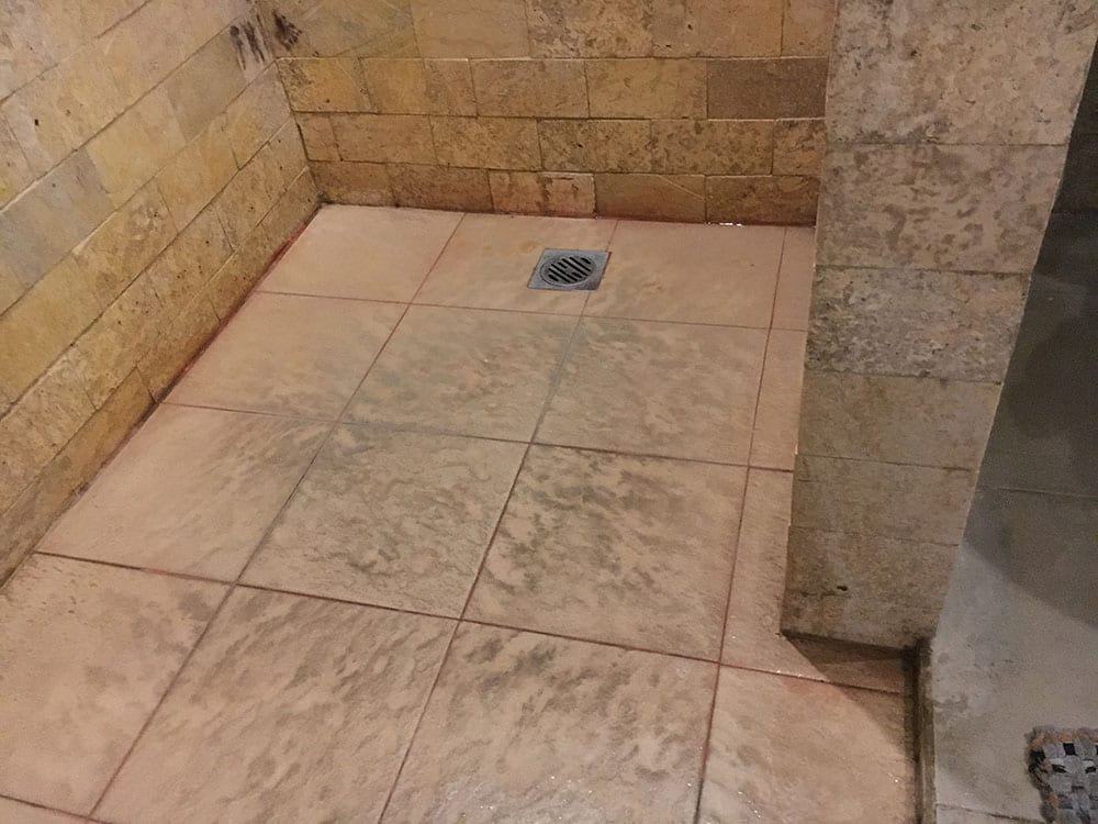 Pink mould on shower floor