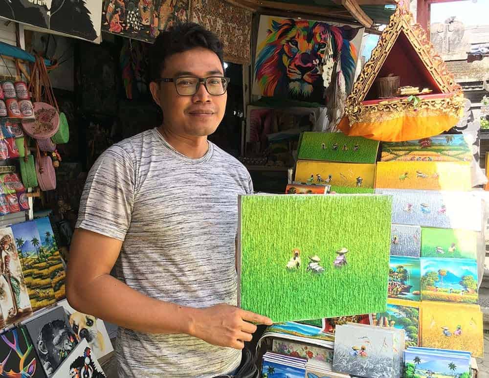 Buying art at Ubud market