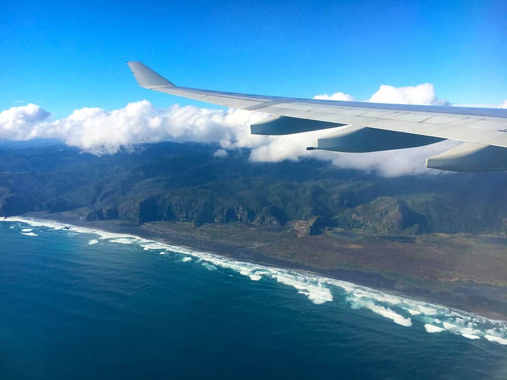 Plane wing over Northland