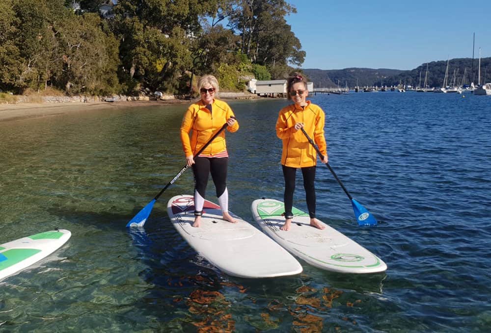 Megan on stand up paddle board