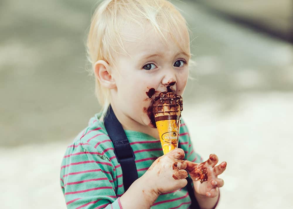 Baby with messy ice cream