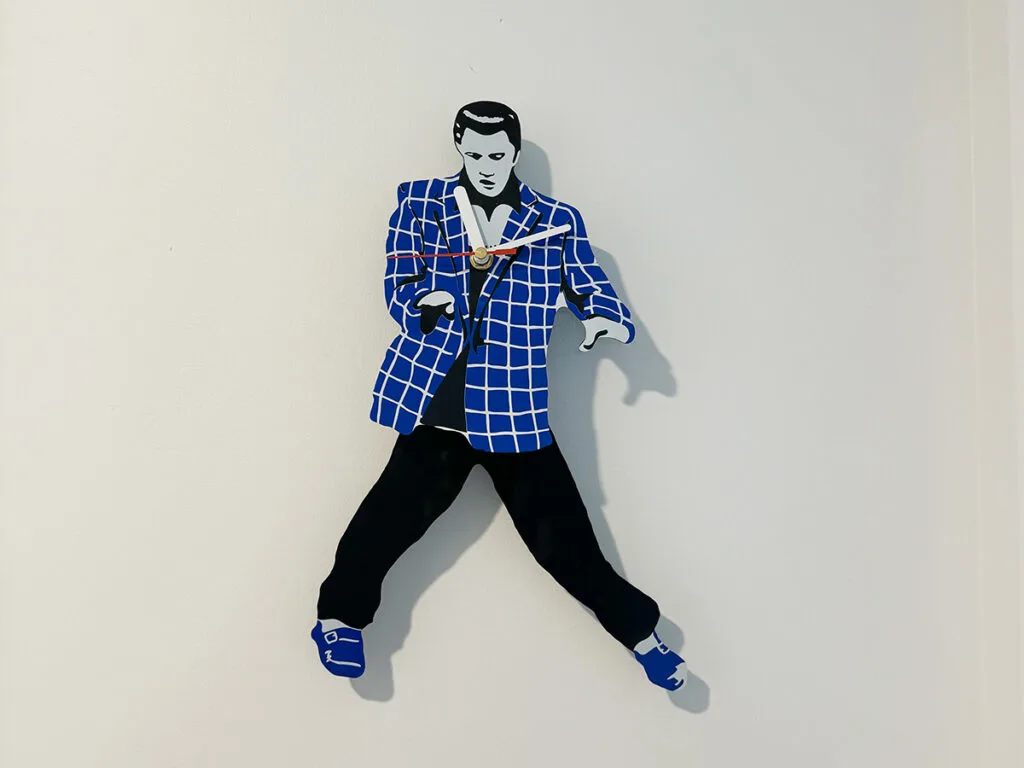 Elvis pendulum clock