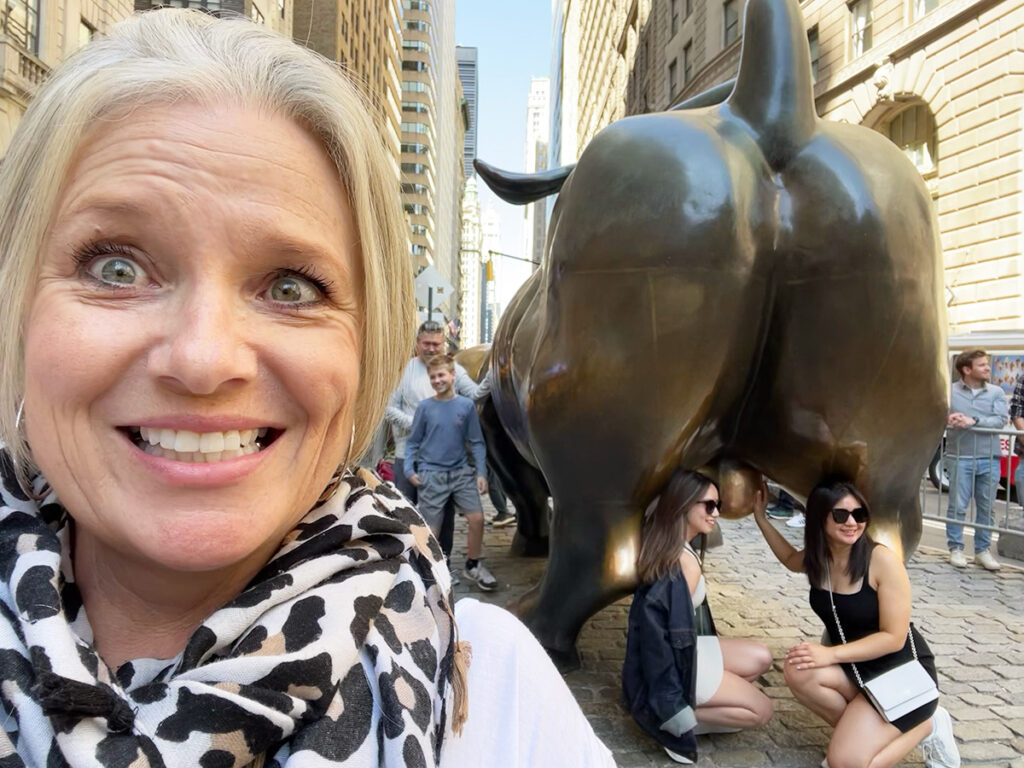 Megan with Wall Street bull