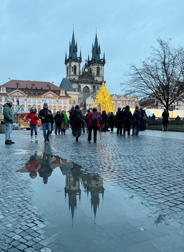 Reflection of St Vitus Cathedral, Prague, in a puddle
