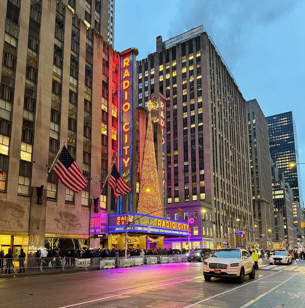 Radio City Music hall with a car in front