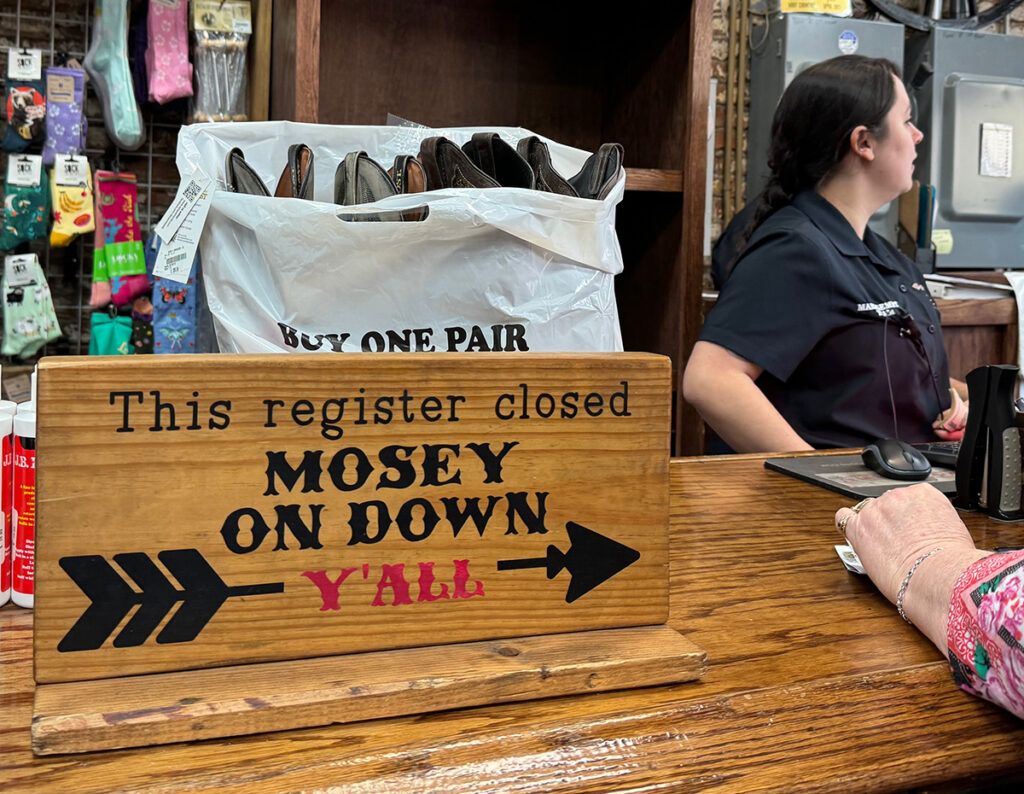 The cash register sign at Boot Country