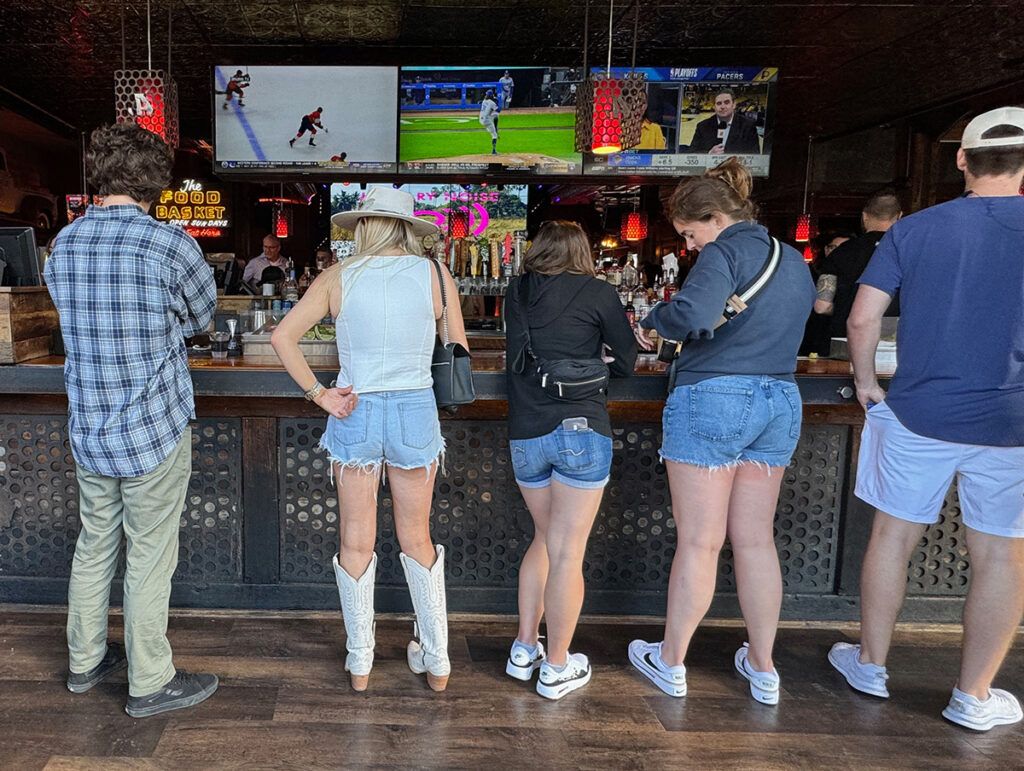 Short shorts, sneakers and boots at the bar in Nashville